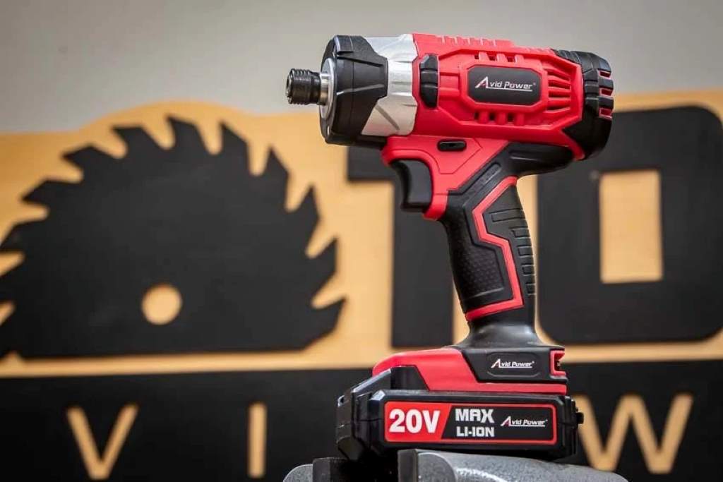 AVID POWER 20V drill in use on wooden beam, showcasing ergonomic grip and LED light for eco-friendly drilling