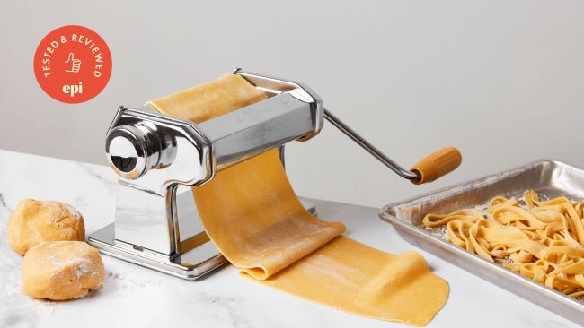 Close-up of Imperia Titania pasta maker producing homemade pasta for home chefs.