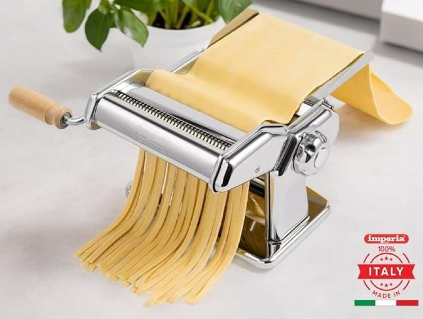 Close-up of the Imperia pasta maker rollers and clamp, highlighting traditional Italian craftsmanship and build quality.
